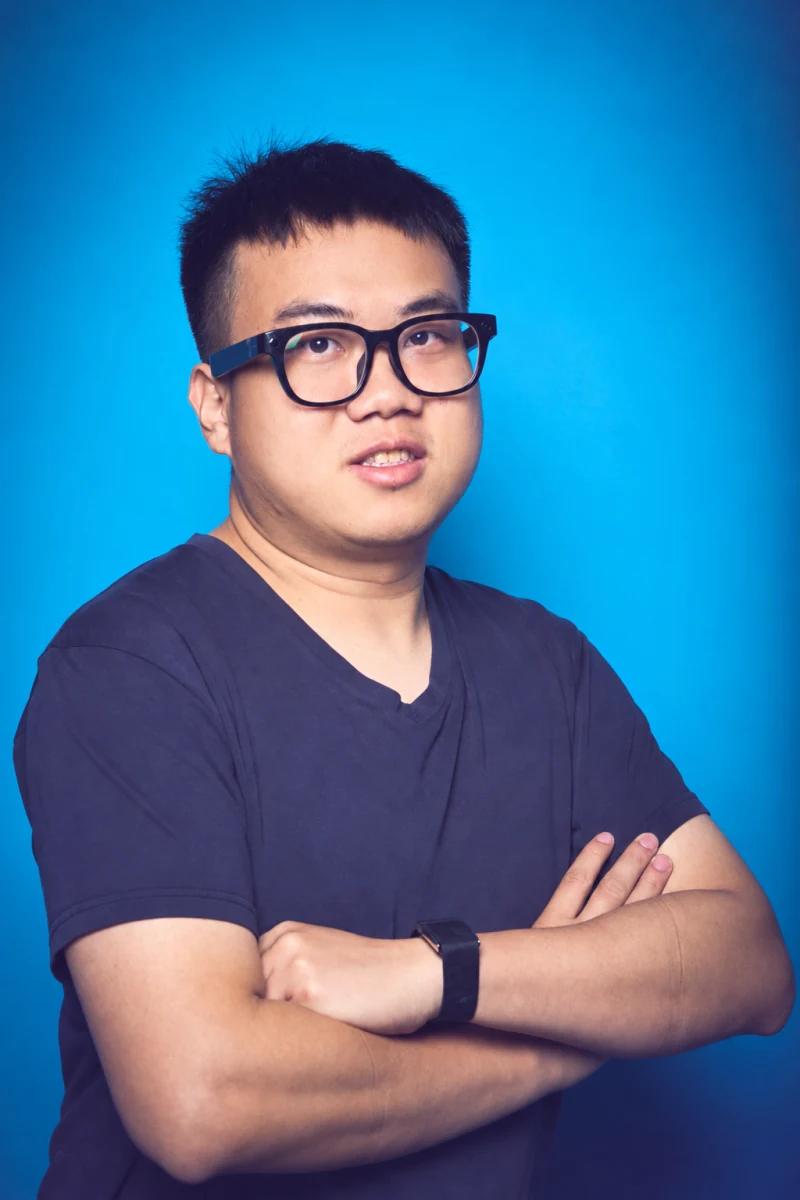 Jinfa Huang against a blue background